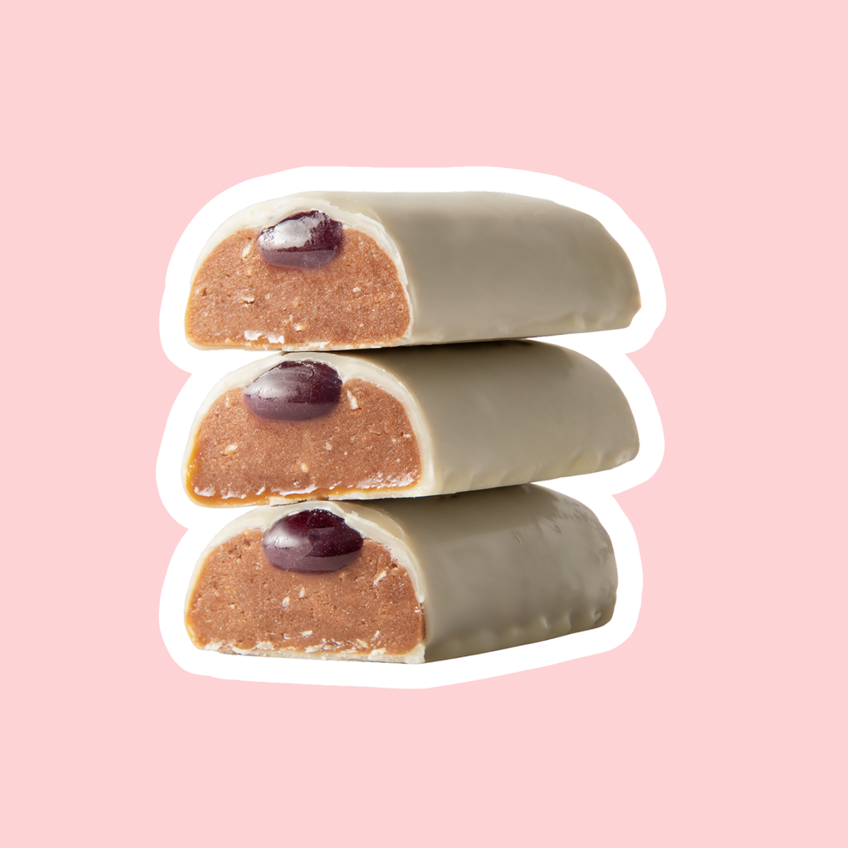 Jam Roly-Poly Soft bars cut open showing white chocolate coating, soft centre and jammy caramel
