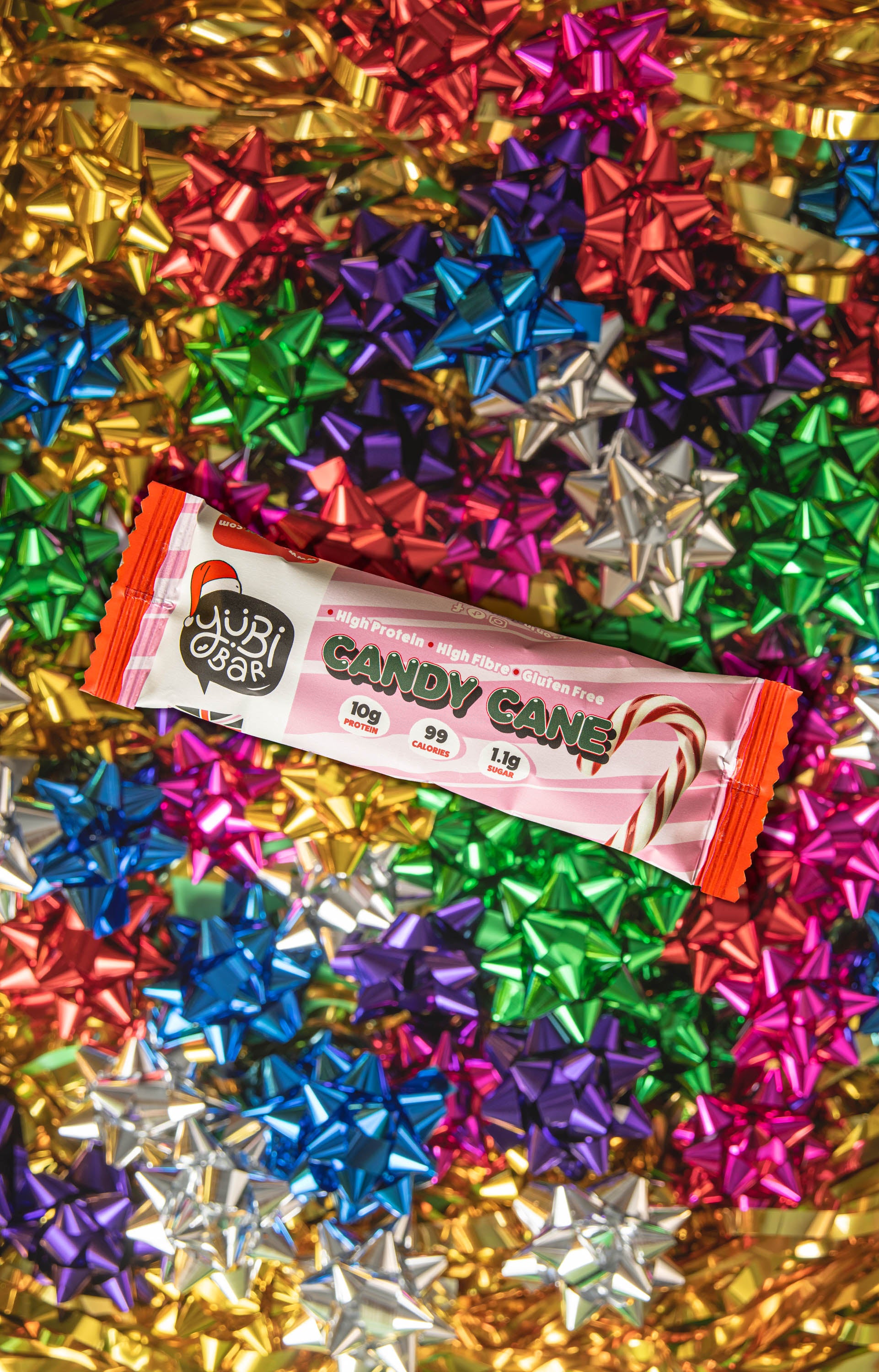 YuBi candy cane christmas protein bar on christmas wrapping