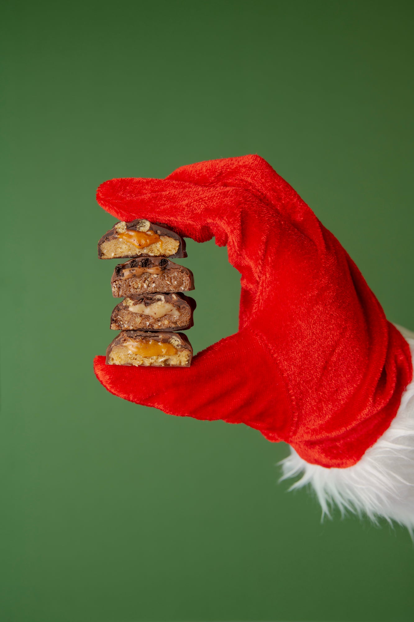 santa holding yubibar christmas protein bars