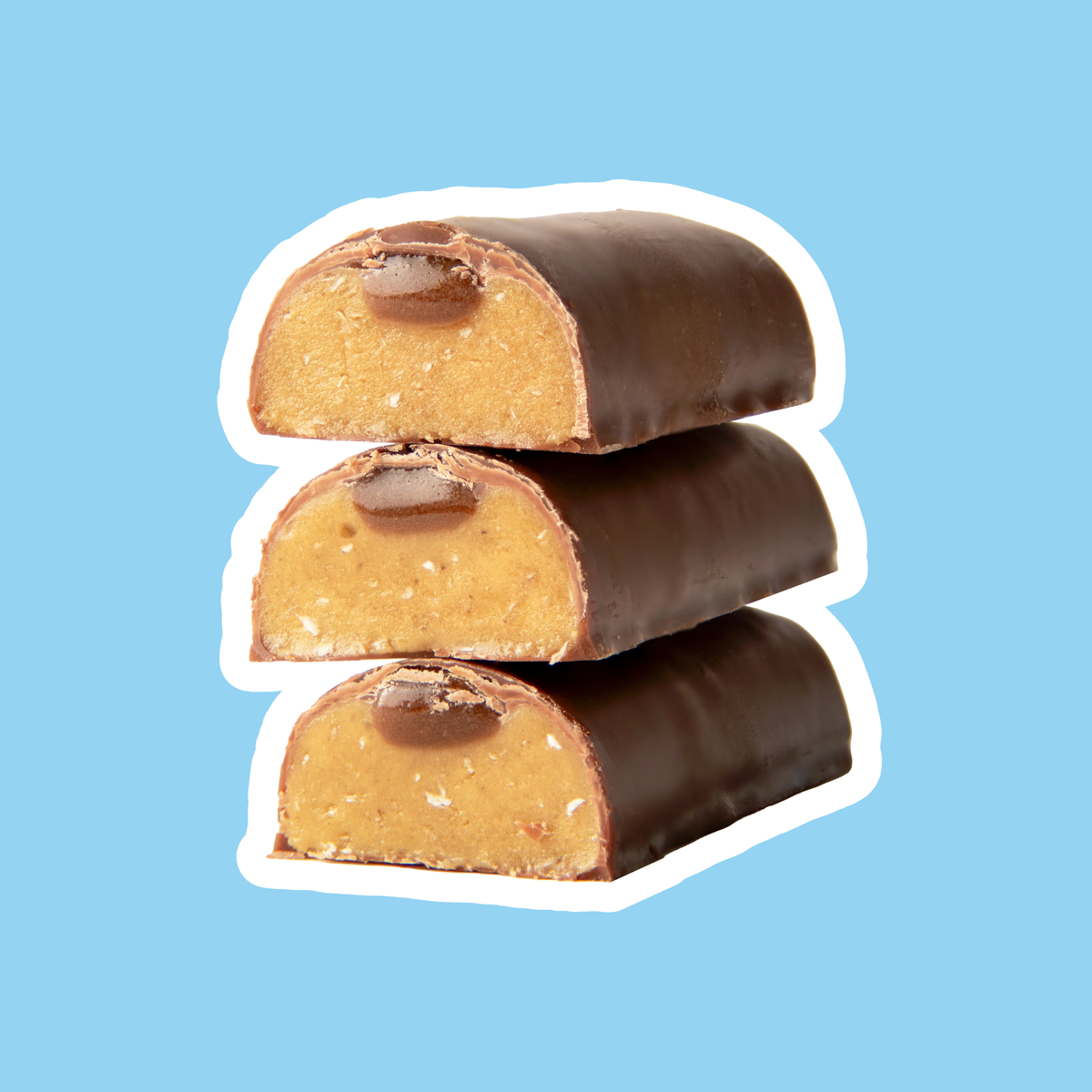 Cookie Dough Soft bars cut open showing milk chocolate coating, cookie dough centre and caramel