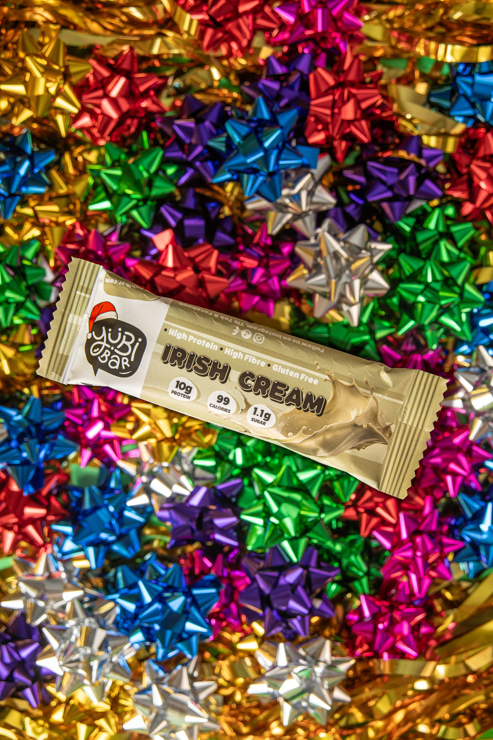 YuBi irish cream christmas protein bar on christmas wrapping