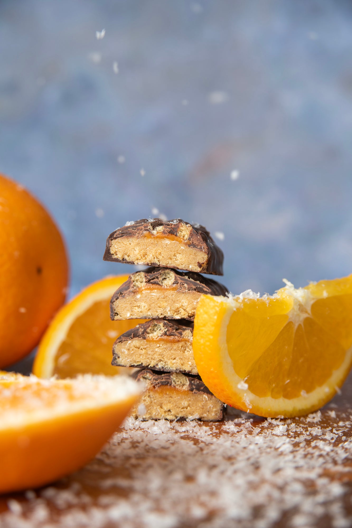 yubibar choc orange protein bar with fresh orange slices in the snow